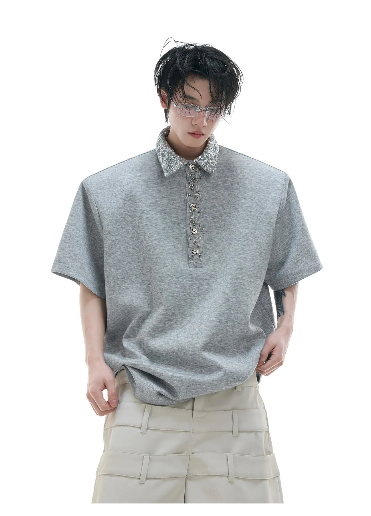 Loose fit square neck short sleeved shirt with sequin decoration in black, grey, or white.
