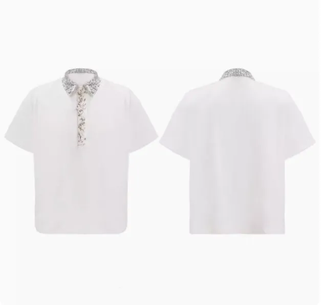 Loose fit square neck short sleeved shirt with sequin decoration in black, grey, or white.