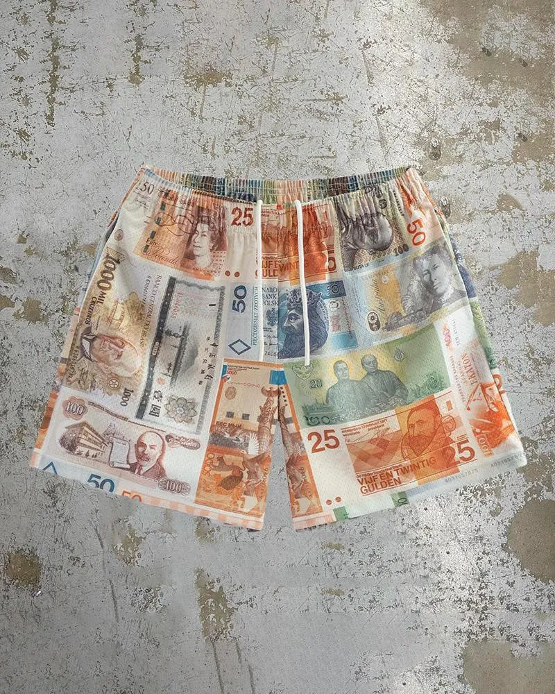 Man wearing loose blue digital print beach shorts made from quick-dry milk silk polyester fabric.