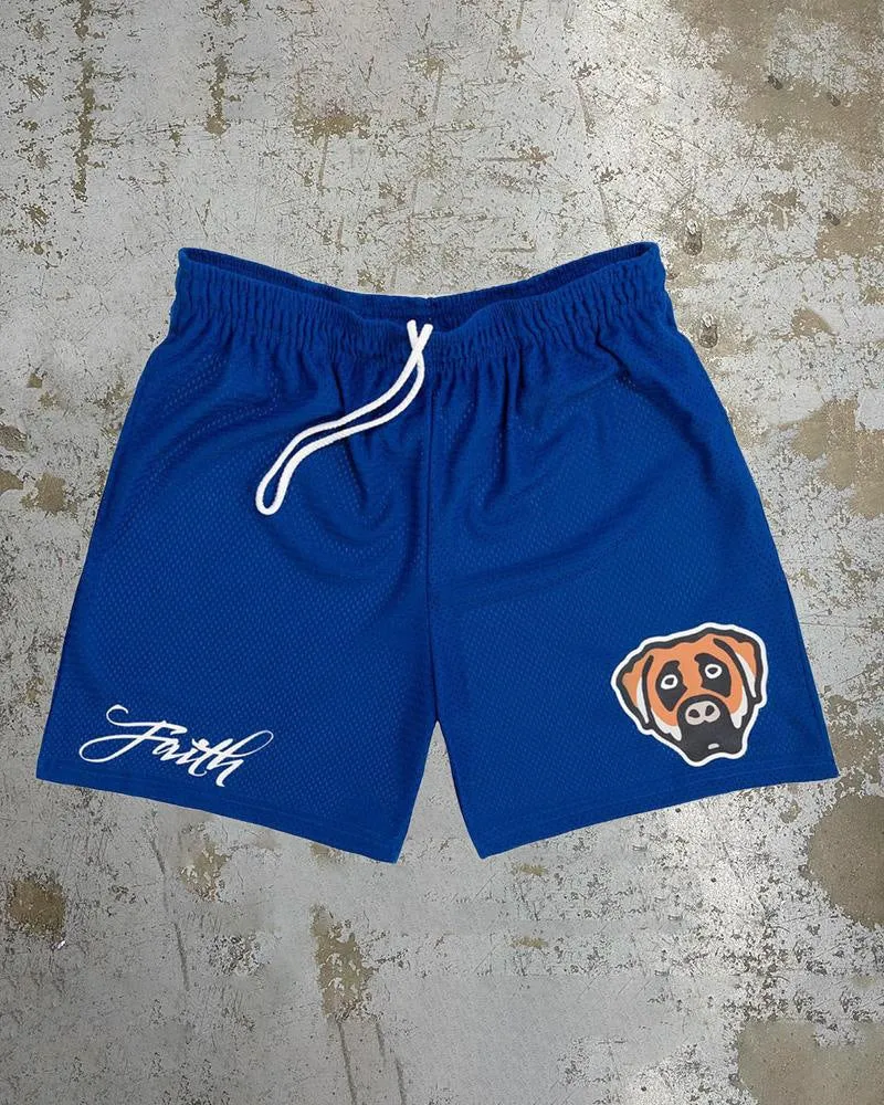 Man wearing loose blue digital print beach shorts made from quick-dry milk silk polyester fabric.