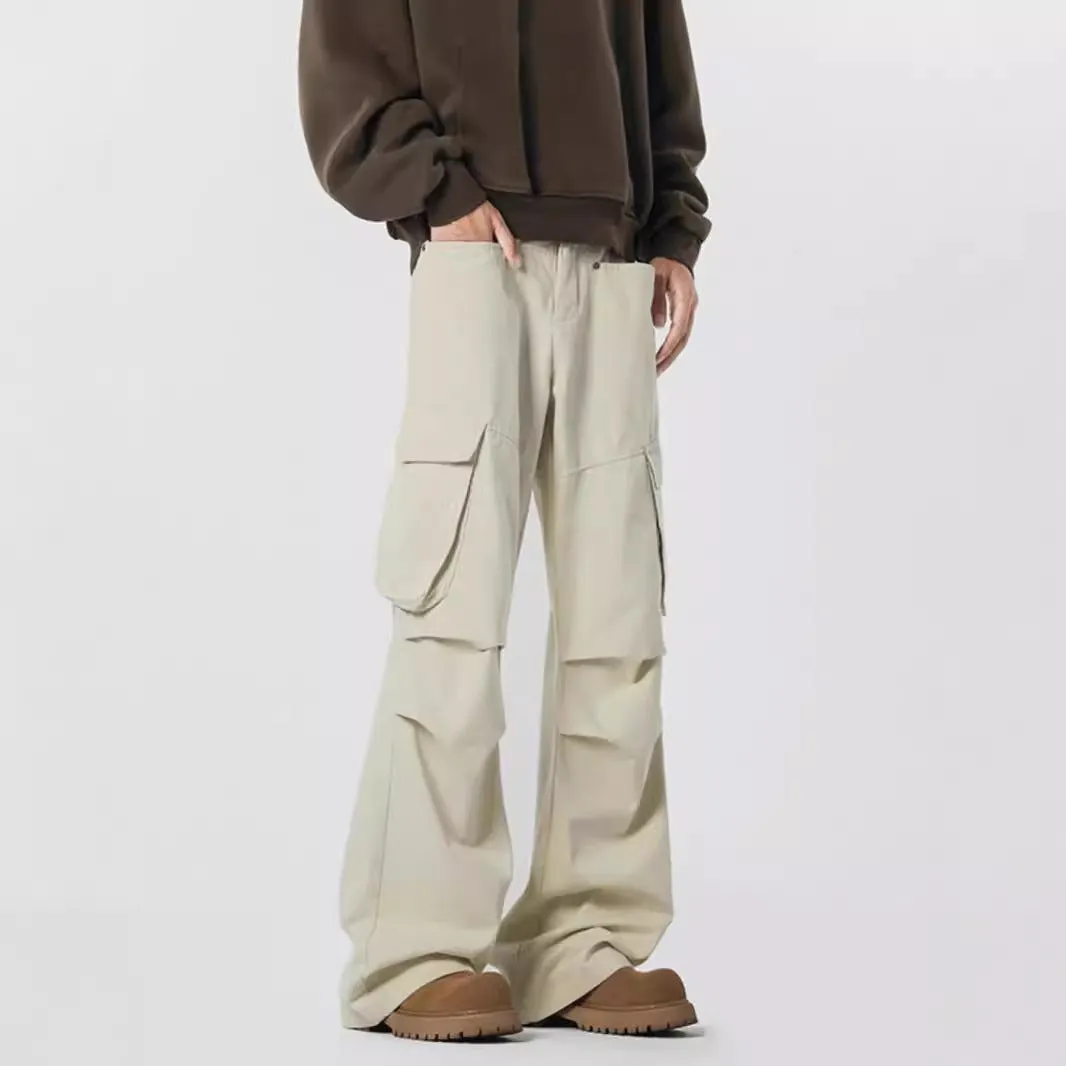 Man wearing retro style high-waisted straight leg casual trousers in black.
