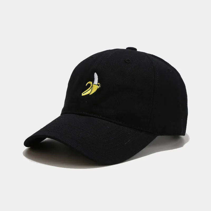 Curved peak baseball cap with embroidered banana fruit design in light purple colour on a white background.