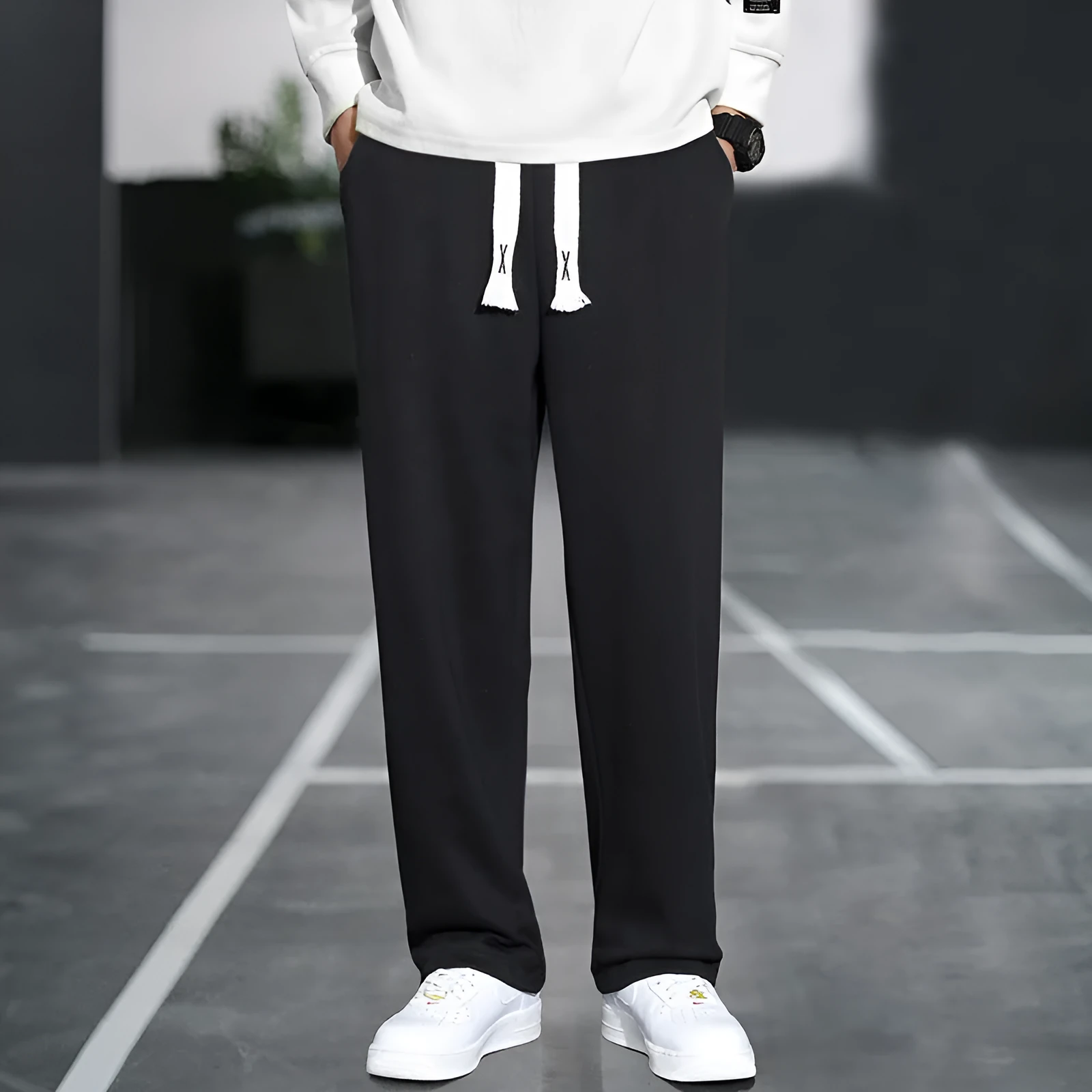 Men's grey casual trousers with multiple pockets showing high waist design and full length
