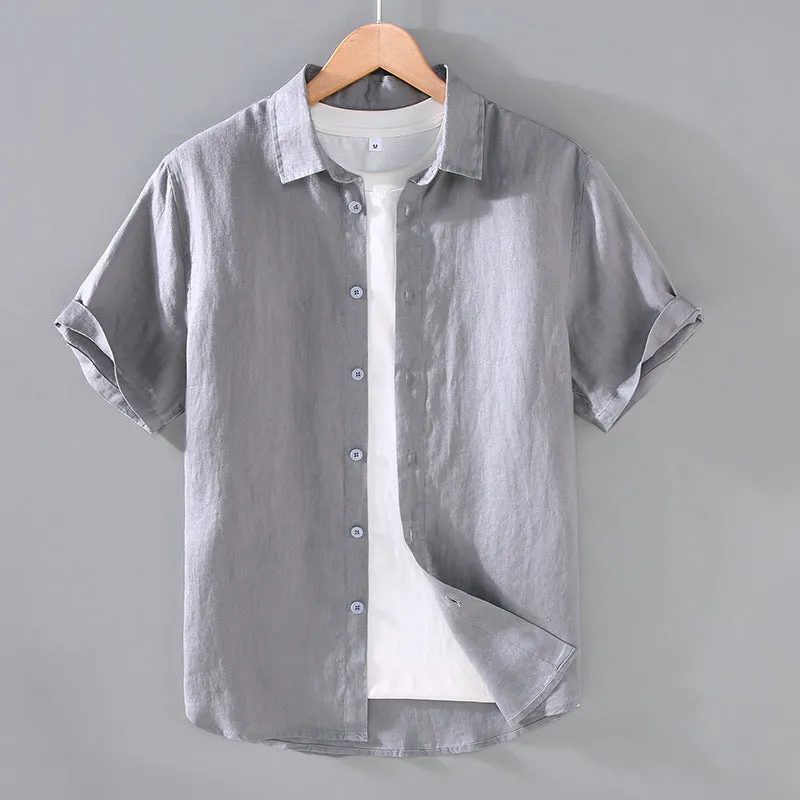 Men's casual short-sleeved linen shirt in regular fit showing colour options including apricot, dark blue, and gray