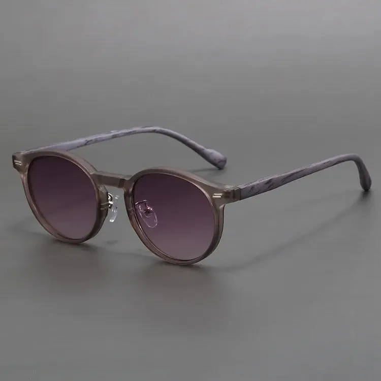 Retro frosted round rim sunglasses with patterned lenses in sand white frame and grey yellow lenses.