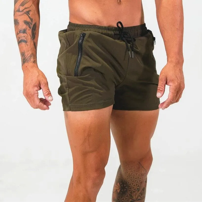 Man wearing mid-waist blue casual sports shorts made from quick-dry polyester fabric.