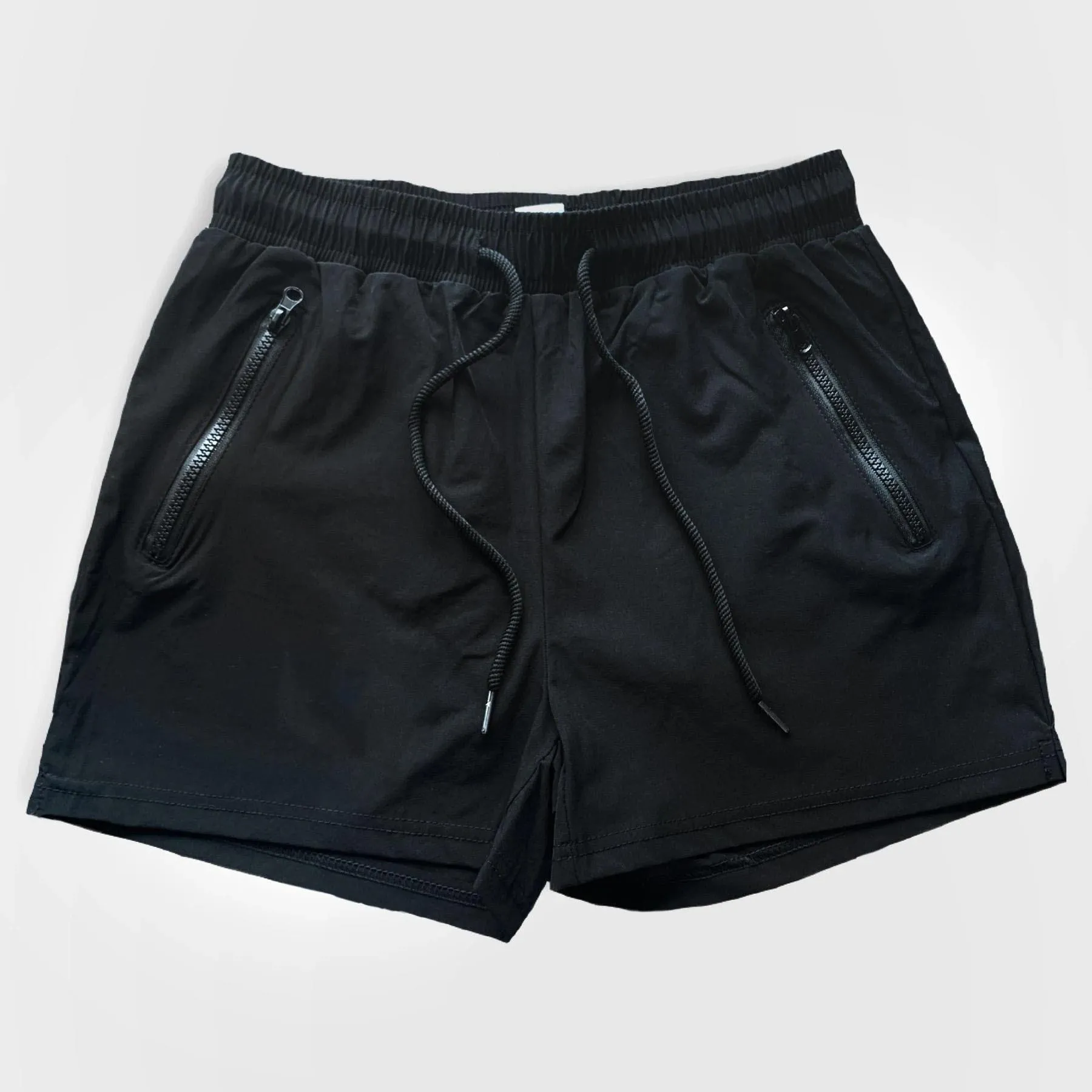 Man wearing mid-waist blue casual sports shorts made from quick-dry polyester fabric.