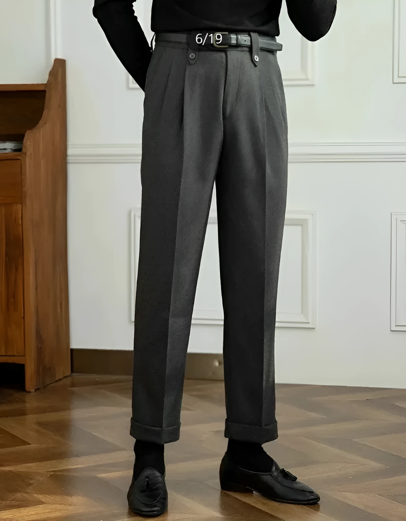 Grey straight-leg high-waist casual trousers on hanger showing regular fit