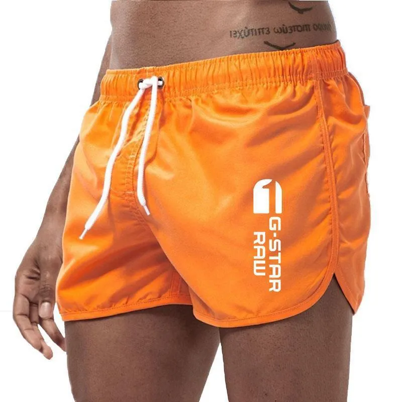 Men's thin polyester hemp-blend beach shorts in various colours with micro-elastic waistband for sports