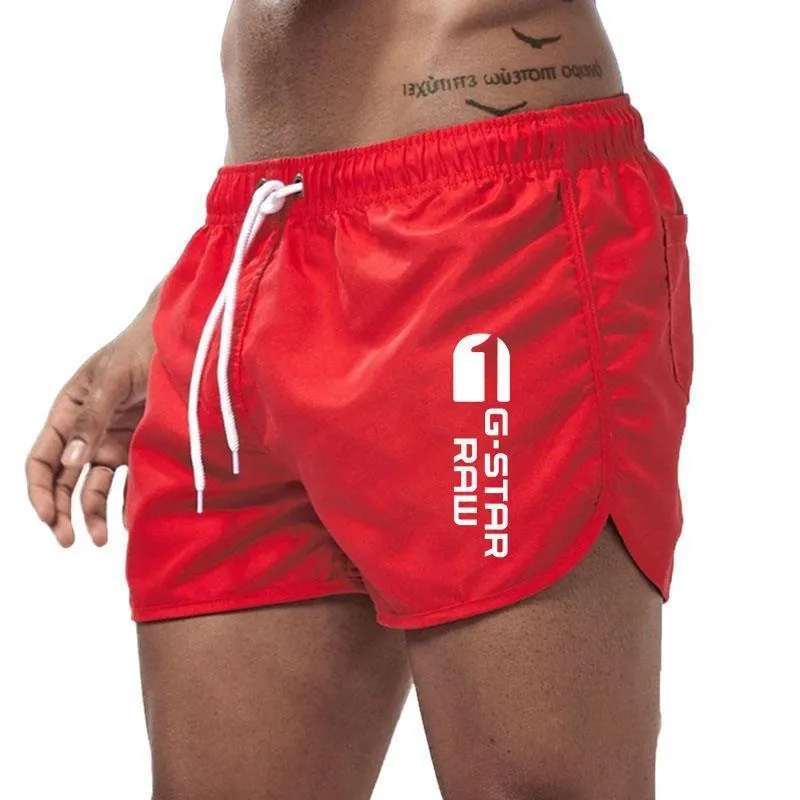 Men's thin polyester hemp-blend beach shorts in various colours with micro-elastic waistband for sports