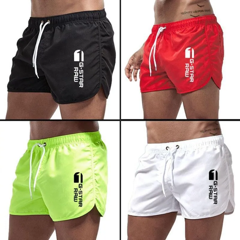 Men's thin polyester hemp-blend beach shorts in various colours with micro-elastic waistband for sports
