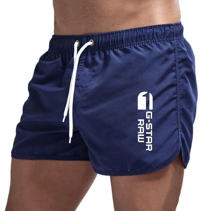 Men's thin polyester hemp-blend beach shorts in various colours with micro-elastic waistband for sports