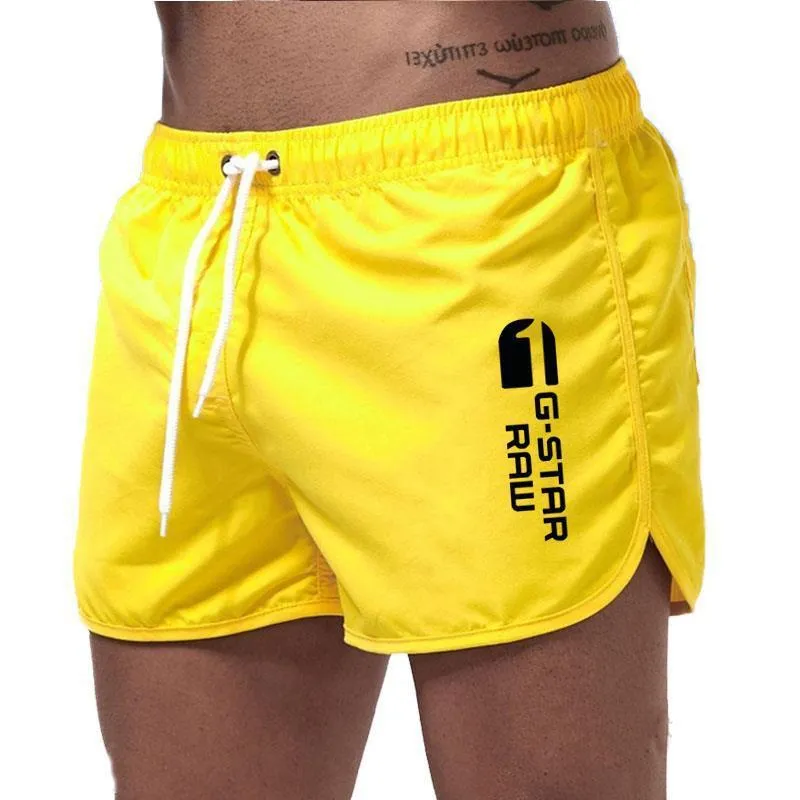 Men's thin polyester hemp-blend beach shorts in various colours with micro-elastic waistband for sports