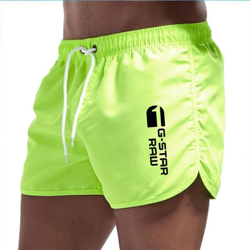 Men's thin polyester hemp-blend beach shorts in various colours with micro-elastic waistband for sports