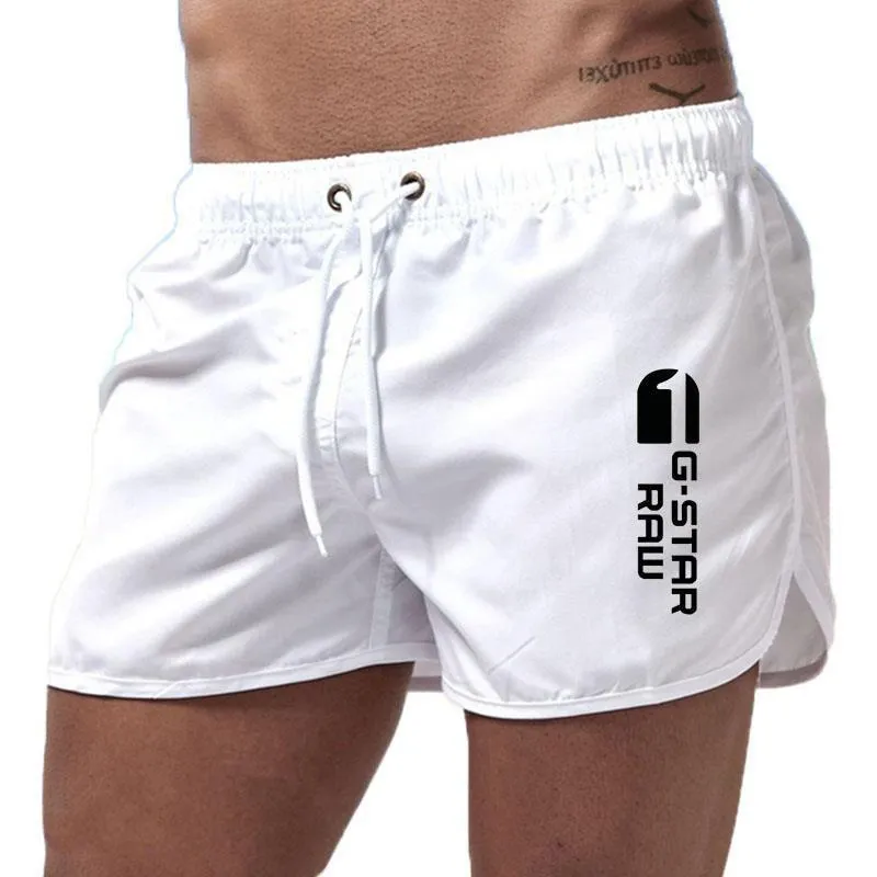 Men's thin polyester hemp-blend beach shorts in various colours with micro-elastic waistband for sports