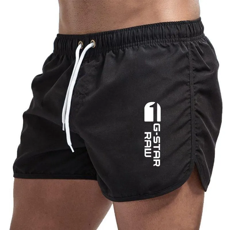 Men's thin polyester hemp-blend beach shorts in various colours with micro-elastic waistband for sports