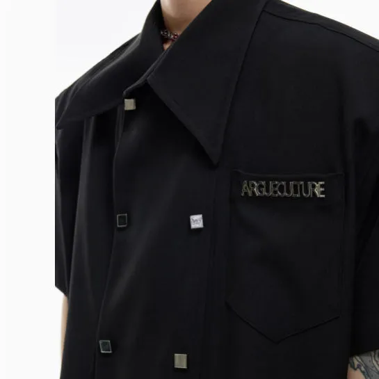 Men's loose-fitting casual short-sleeved shirt in blue with lapel collar and button detail.