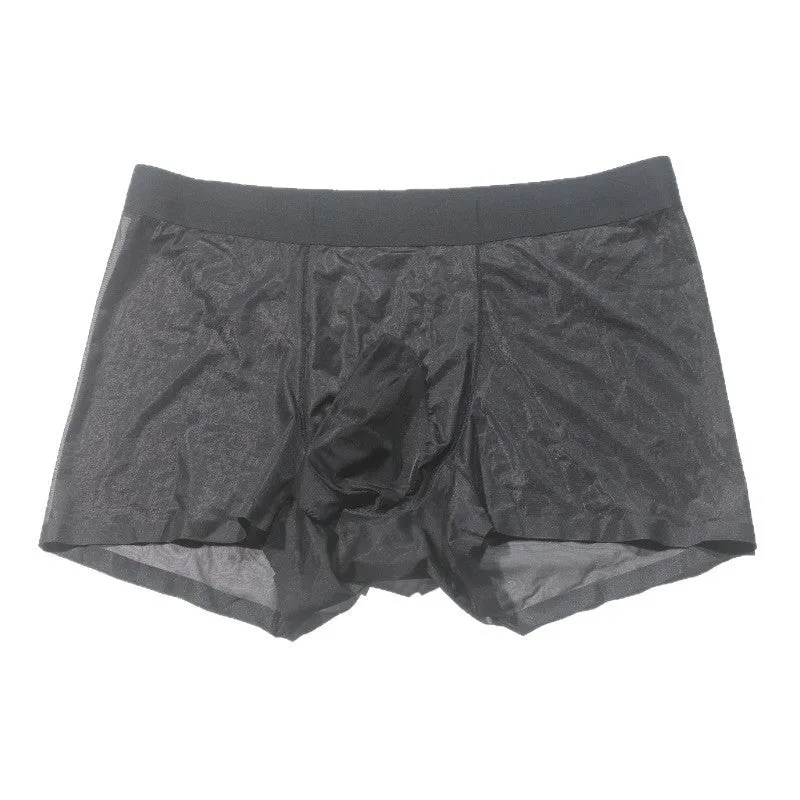 Plus size transparent nylon underwear shorts in skin colour on a hanger, showing seamless mid-waist design.