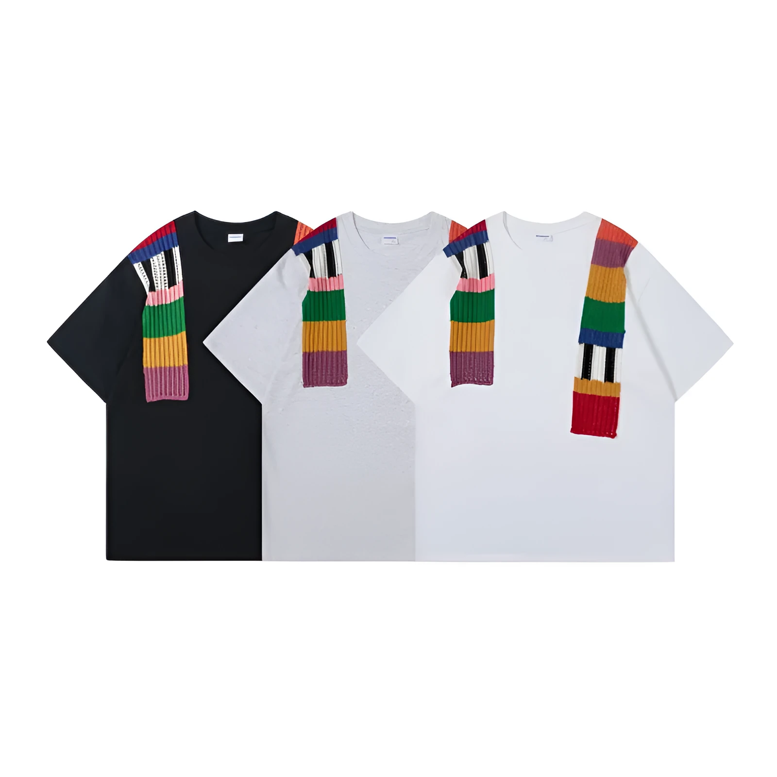 Men's loose grey cotton T-shirt with black and white patchwork letter design on chest.