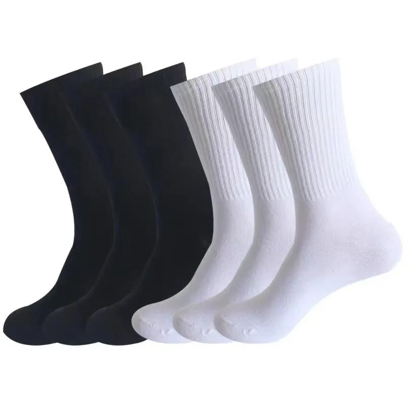 Mid-calf length sports socks in black, white, and grey colours