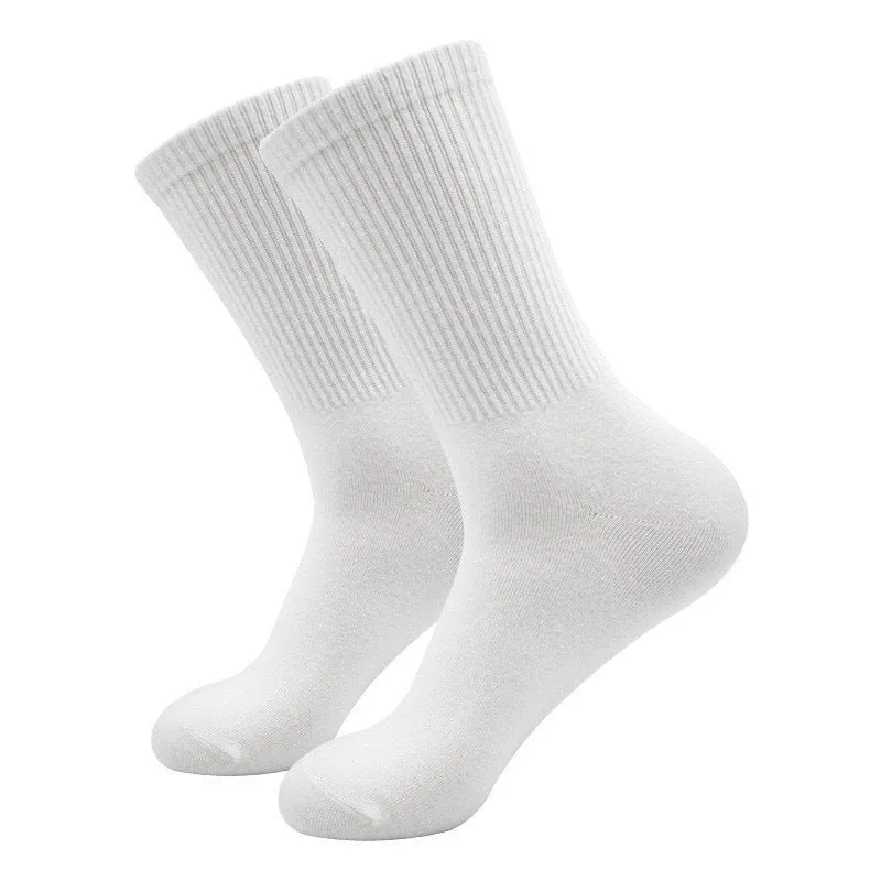 Mid-calf length sports socks in black, white, and grey colours