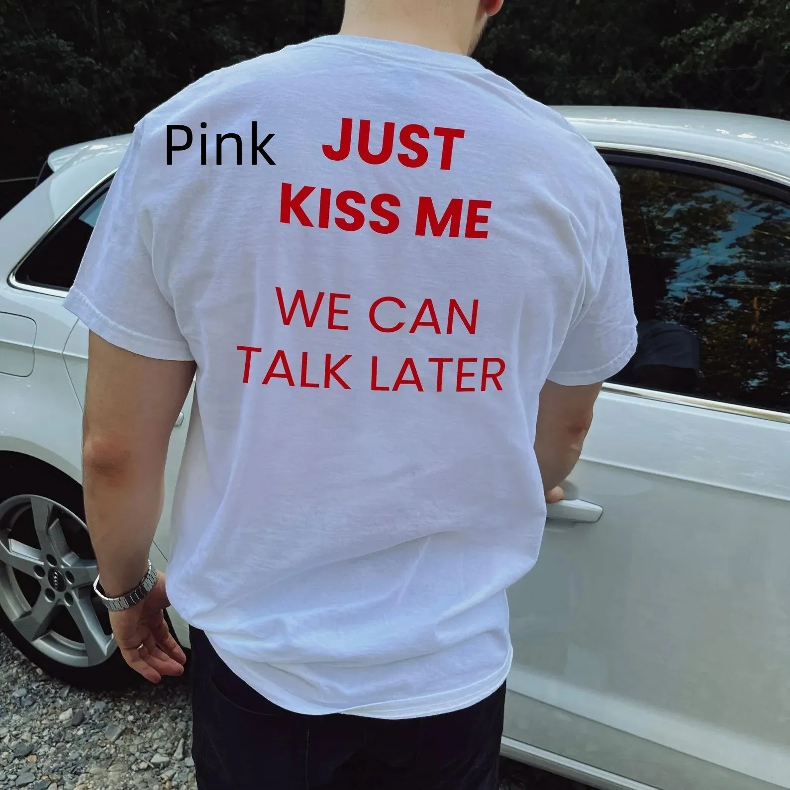 Men's printed short sleeve cotton t-shirt on a hanger showing street fashion design.