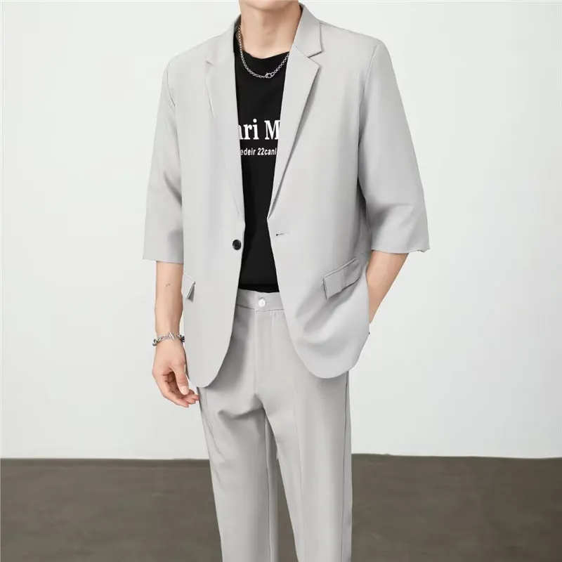 Light business summer suit with half sleeve jacket and trousers in thin cotton fabric