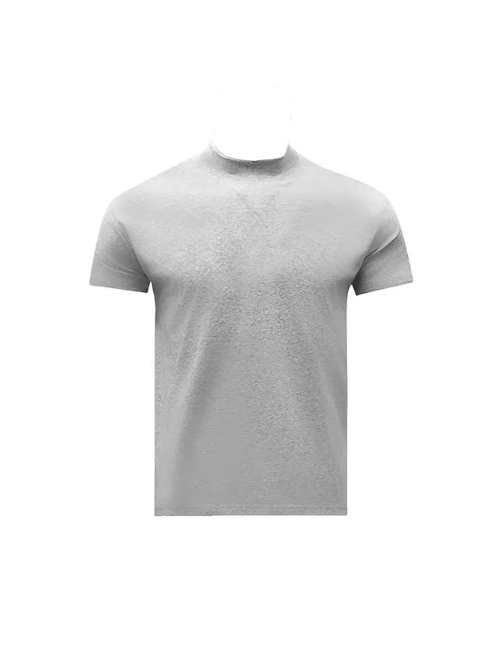 Man wearing a loose-fit grey cotton short-sleeve t-shirt with a half turtleneck cuff shoulder detail.