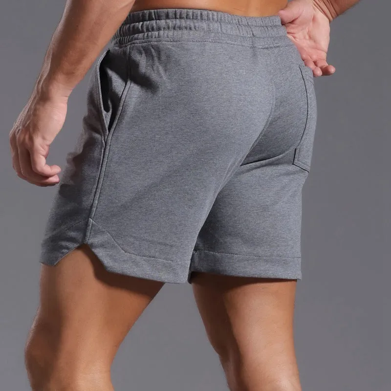 Men's below-the-knee cotton workout capris in charcoal grey with mid-waist design