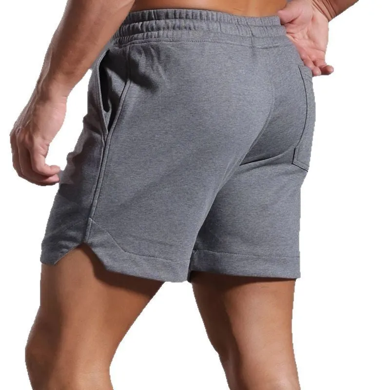 Men's below-the-knee cotton workout capris in charcoal grey with mid-waist design