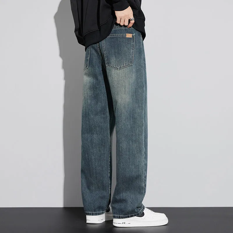 Retro straight-leg jeans for men in light blue cotton denim on a neutral background.