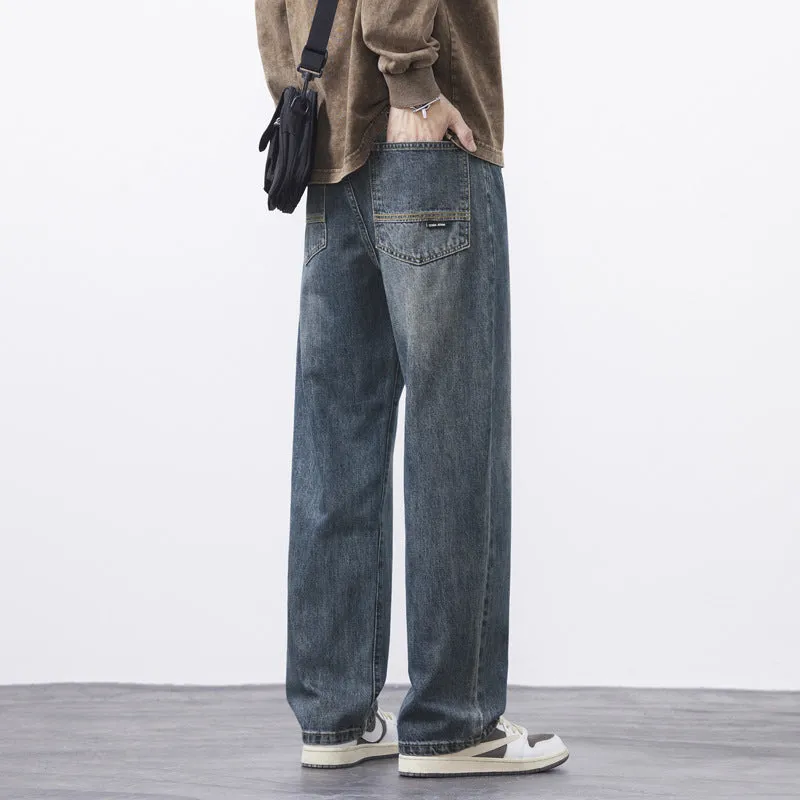 Retro straight-leg jeans for men in light blue cotton denim on a neutral background.