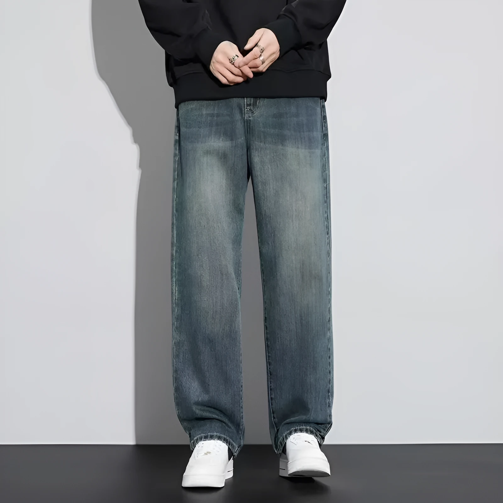 Retro straight-leg jeans for men in light blue cotton denim on a neutral background.