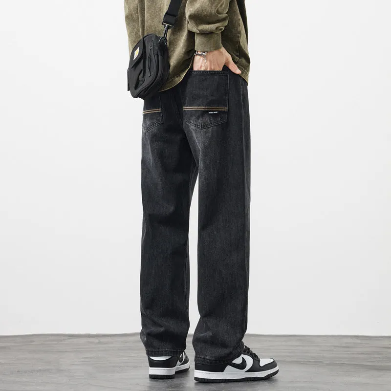 Retro straight-leg jeans for men in light blue cotton denim on a neutral background.