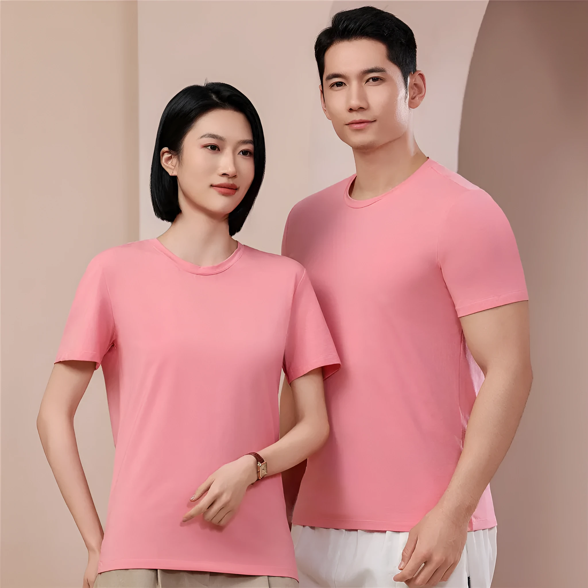 Mercerised modal short sleeve T-shirt in grey green colour on a hanger, showing round neck and plain weave fabric.