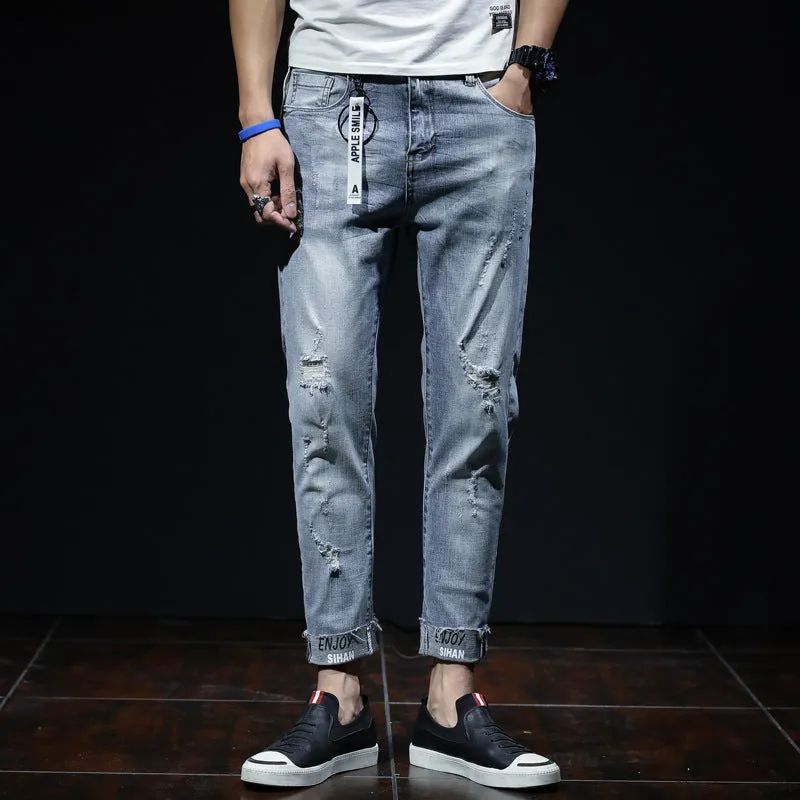 Light blue youth ripped stretch denim cropped skinny jeans mid-waist zip fly