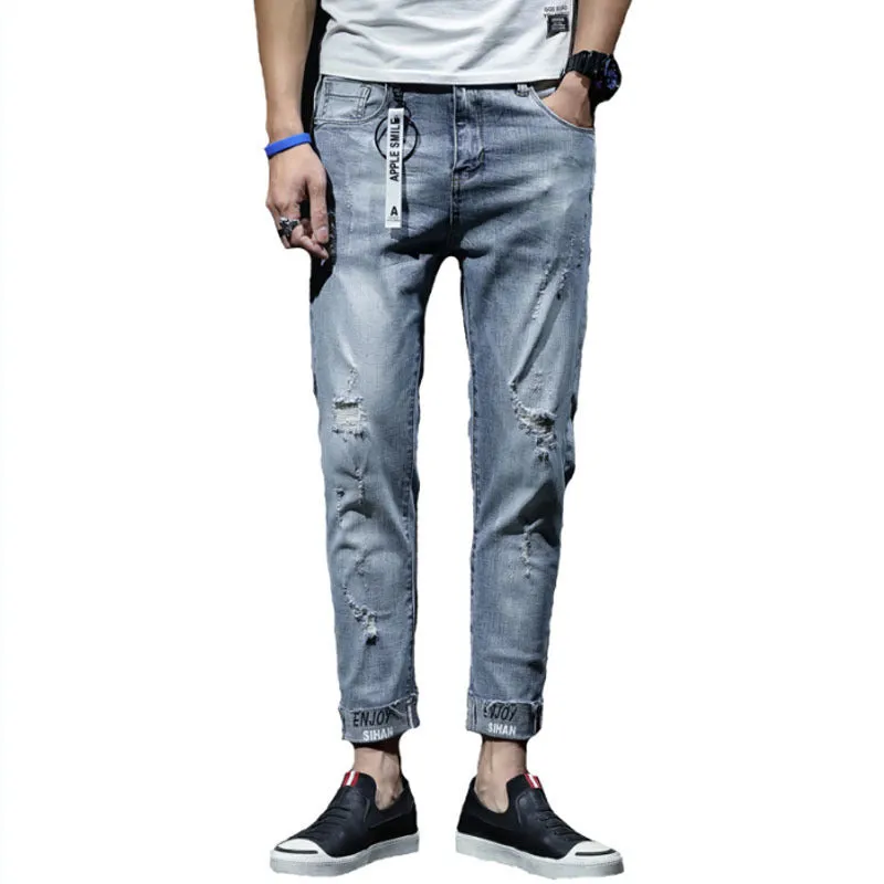 Light blue youth ripped stretch denim cropped skinny jeans mid-waist zip fly