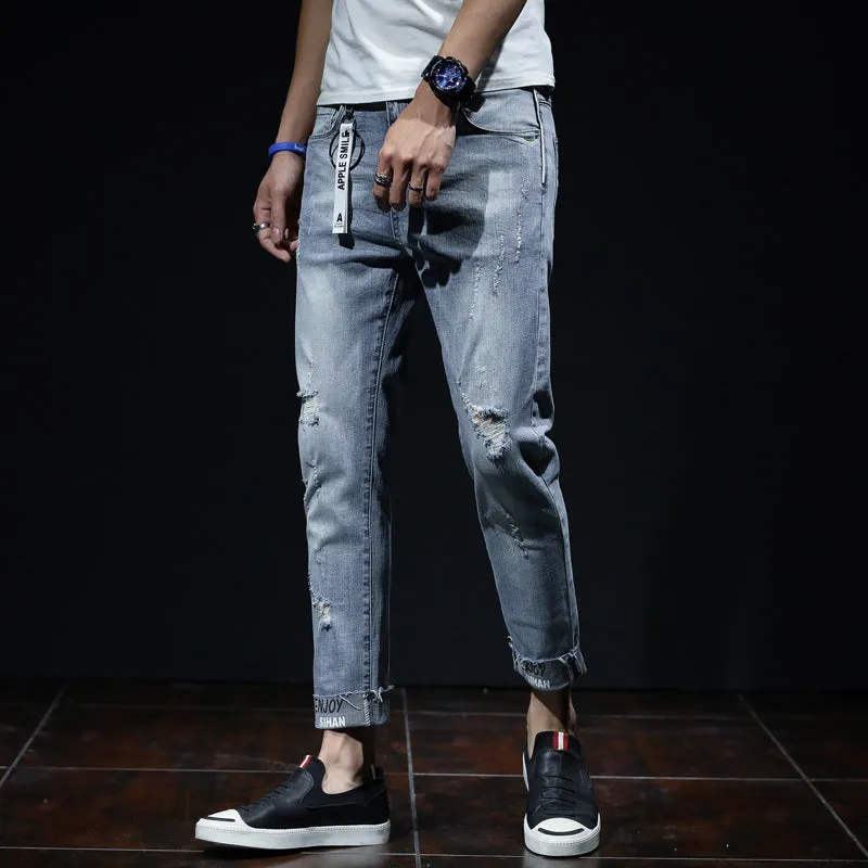 Light blue youth ripped stretch denim cropped skinny jeans mid-waist zip fly