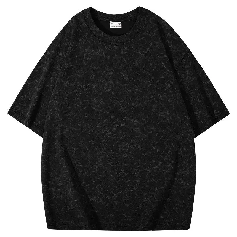 Loose-fit pure cotton batik distressed t-shirt in a solid colour, showing round neck and washed finish.