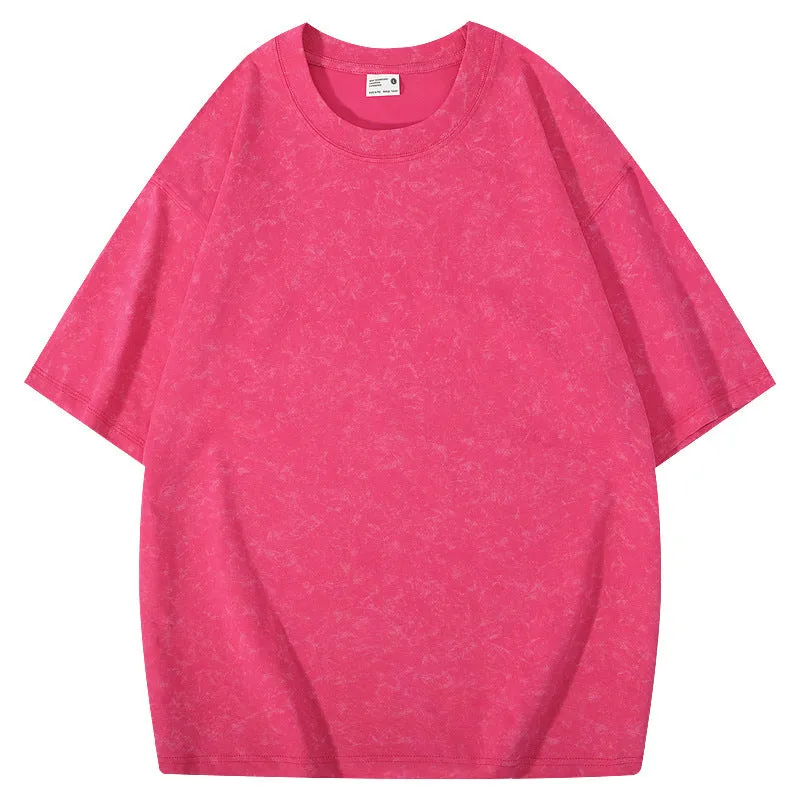 Loose-fit pure cotton batik distressed t-shirt in a solid colour, showing round neck and washed finish.