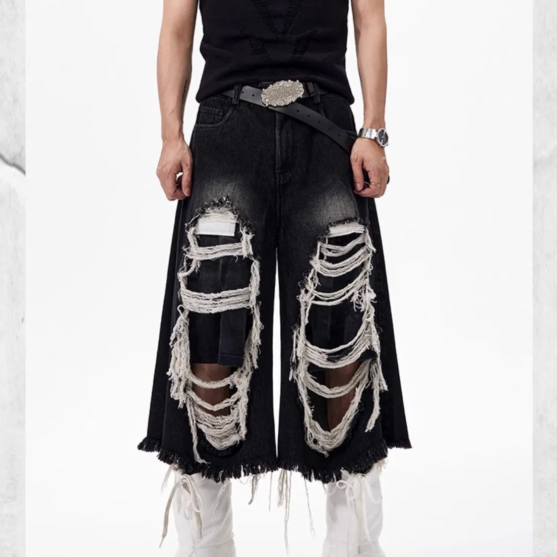 Black women's cropped wide-leg jeans with a mid-high waist and relaxed fit.
