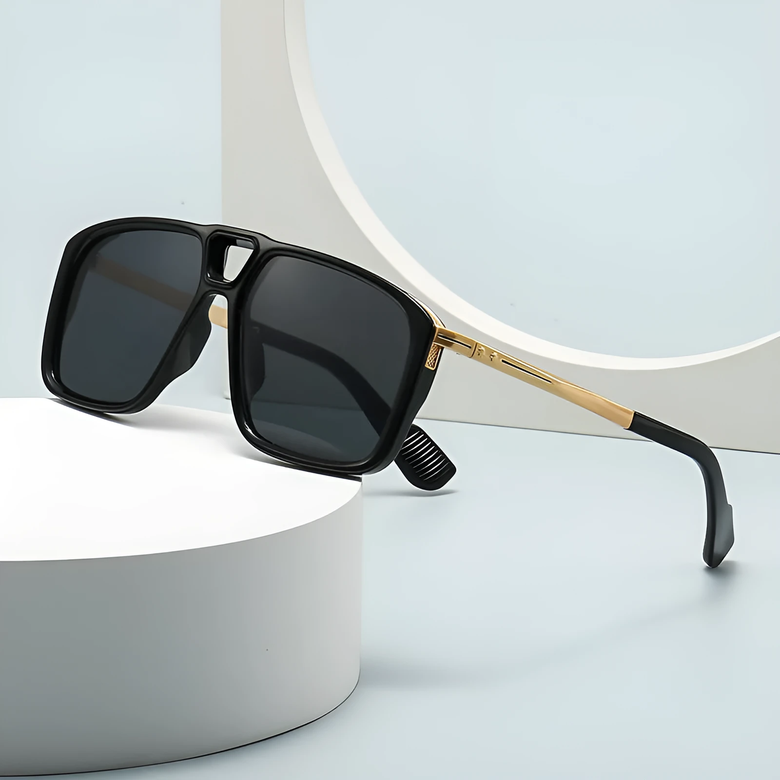 Men's retro double square sunglasses in six colour and style variations on a display.