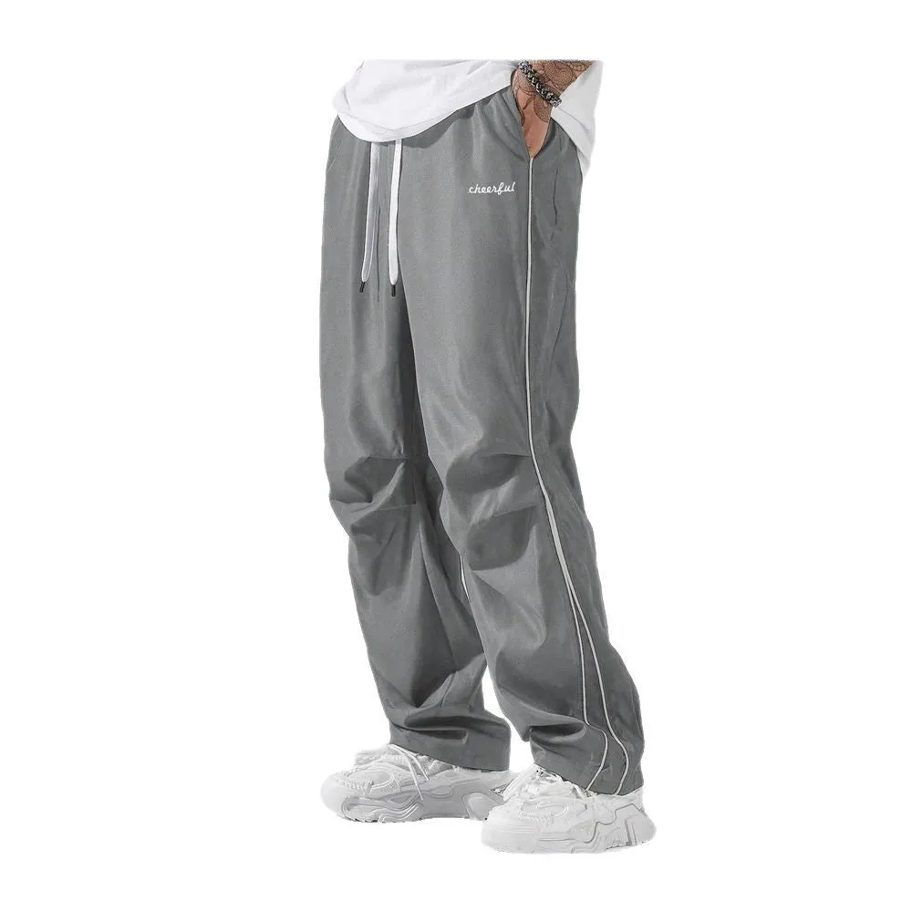 European high street charging paratrooper pants for teenagers, straight-leg acrylic blend trousers, elastic drawstring waist, side view