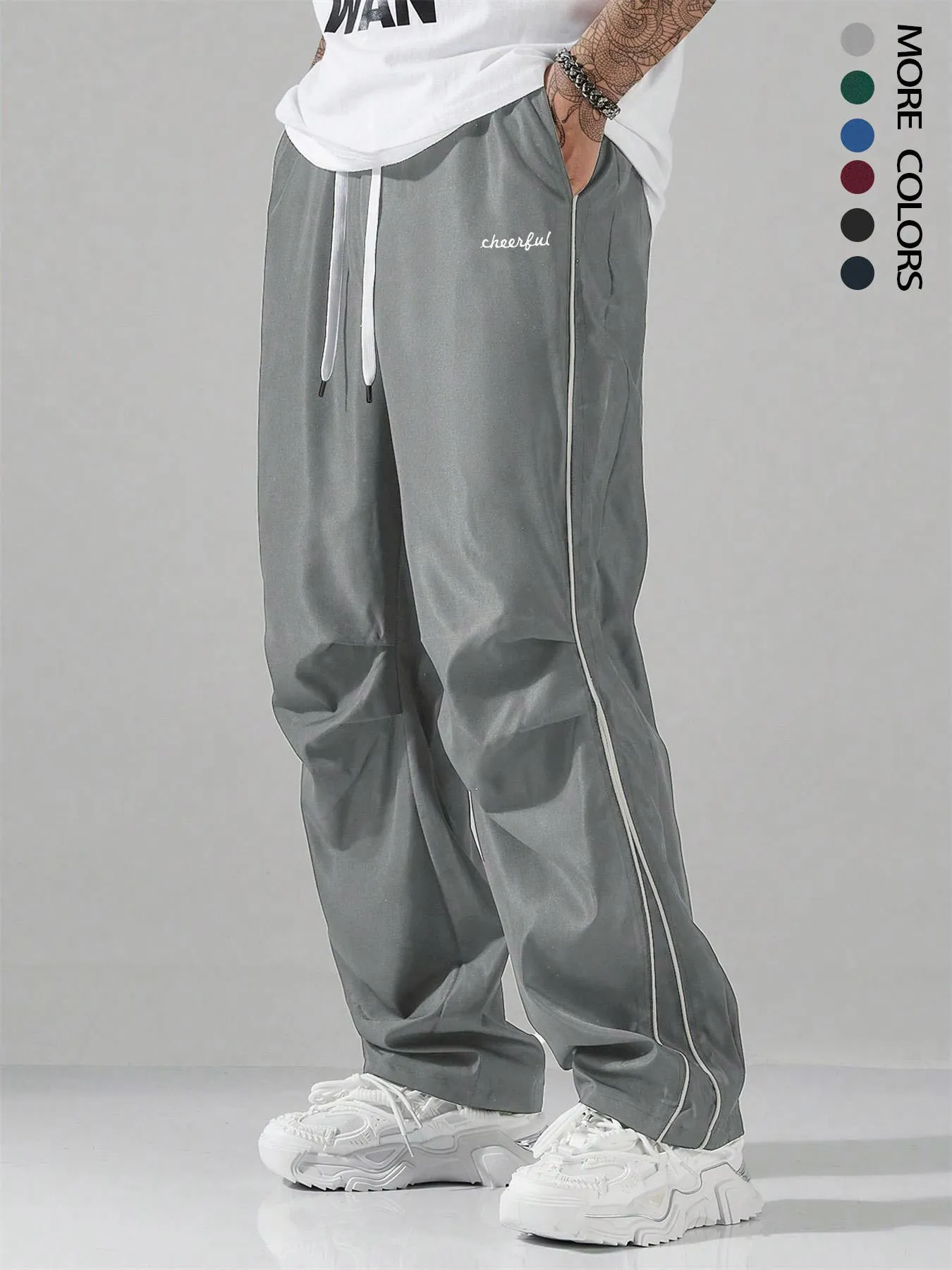 European high street charging paratrooper pants for teenagers, straight-leg acrylic blend trousers, elastic drawstring waist, side view