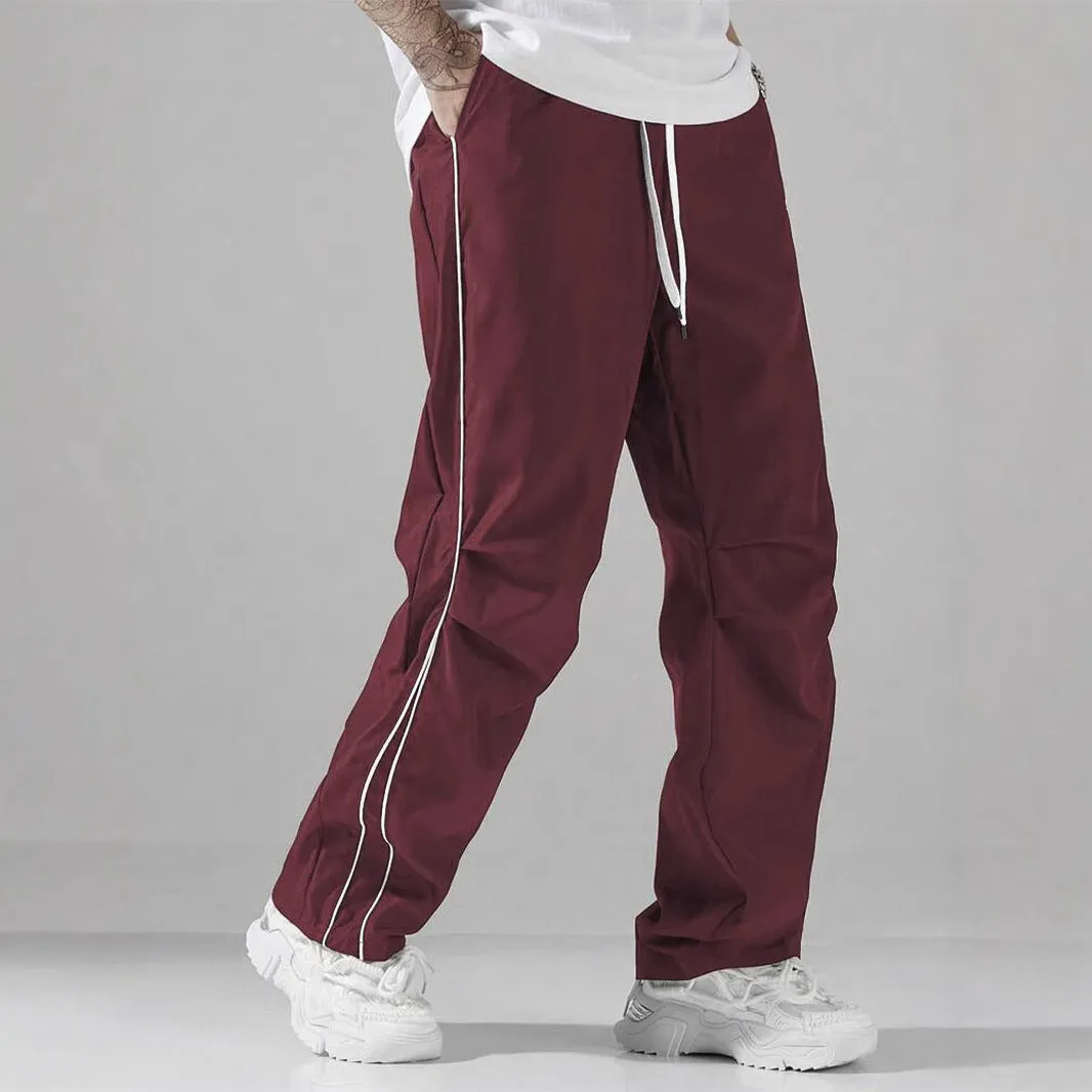 European high street charging paratrooper pants for teenagers, straight-leg acrylic blend trousers, elastic drawstring waist, side view