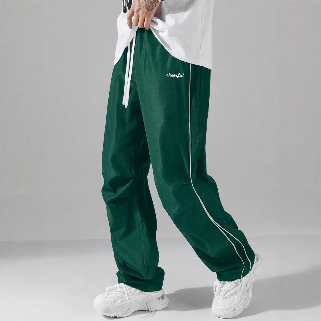 European high street charging paratrooper pants for teenagers, straight-leg acrylic blend trousers, elastic drawstring waist, side view