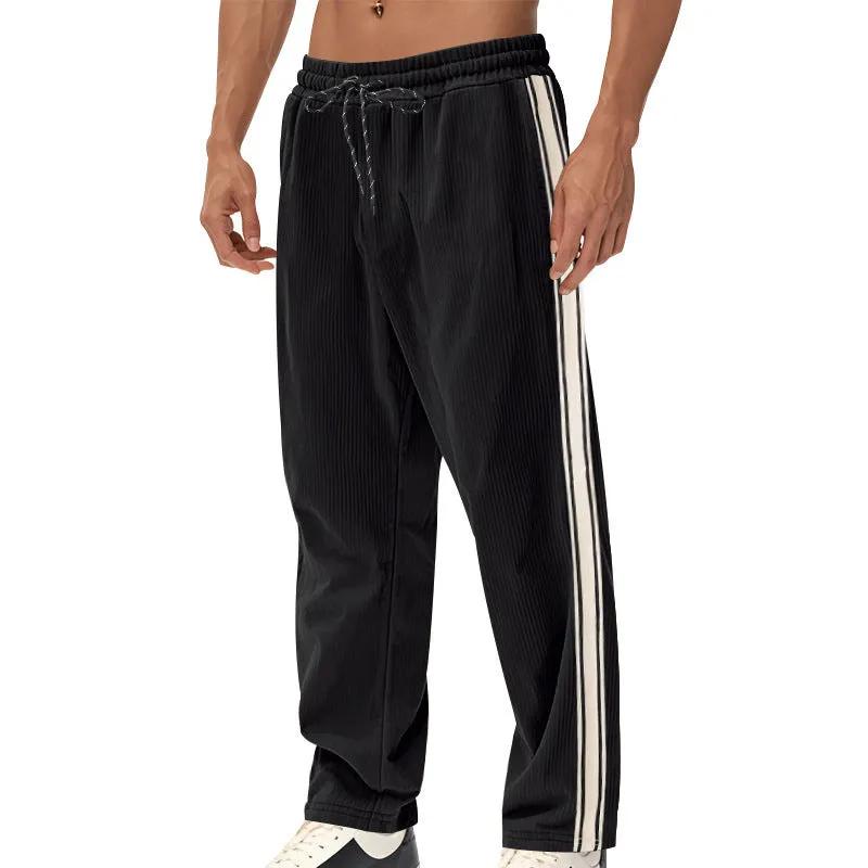 Men's corduroy track pants in dark blue side stripe loose fit