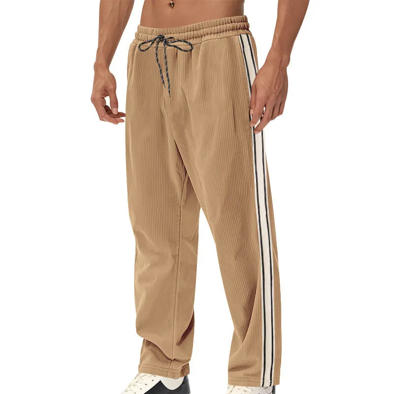 Men's corduroy track pants in dark blue side stripe loose fit