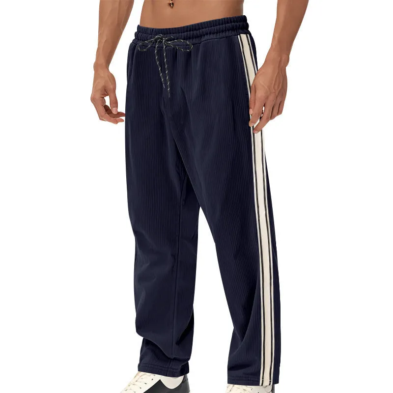 Men's corduroy track pants in dark blue side stripe loose fit