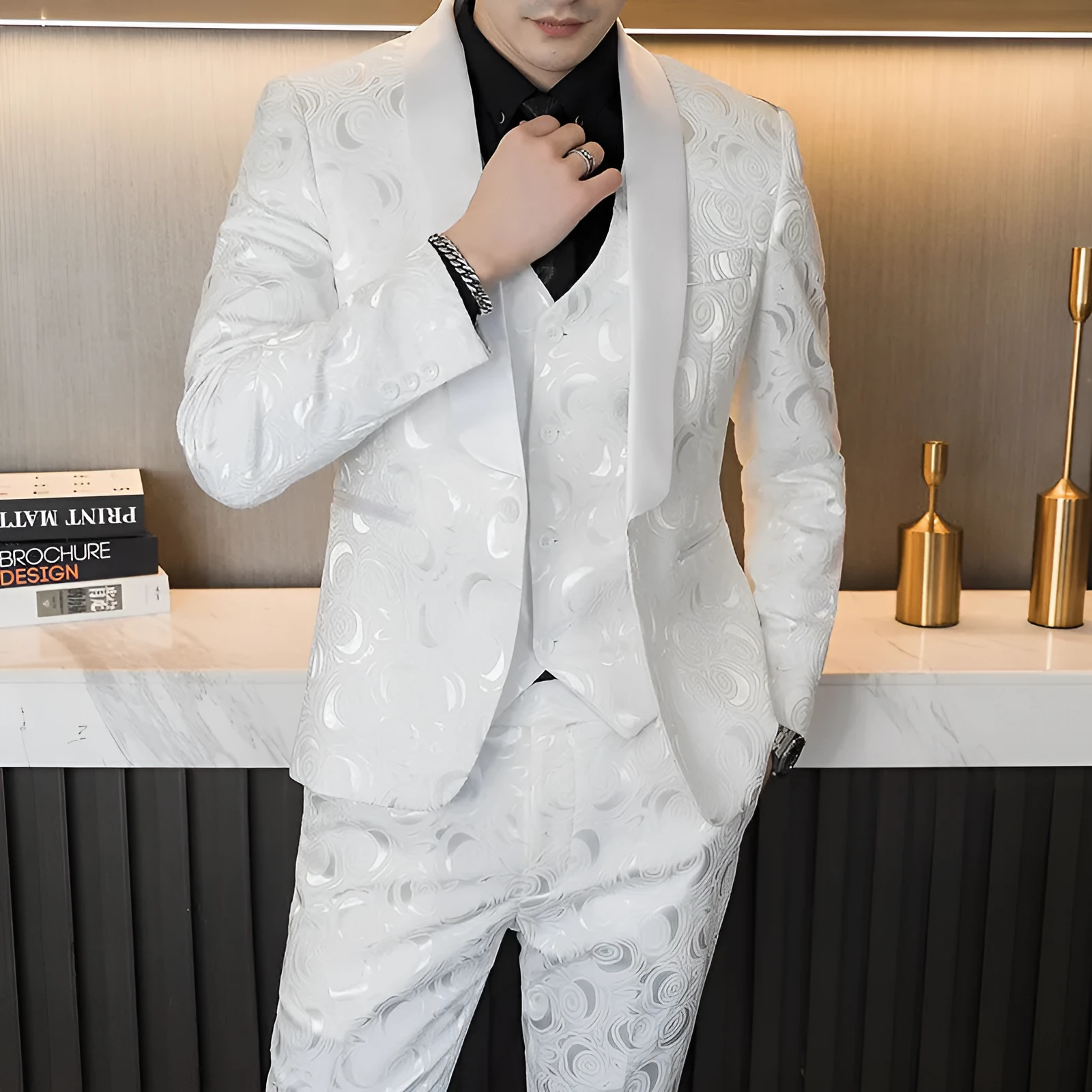 Men's slim fit three-piece wedding suit set in white and black with embossed fabric, jacket, vest, and trousers